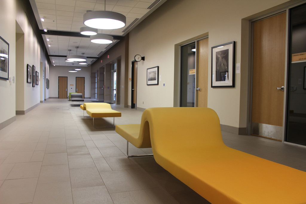 Main Library lobby gallery featuring seating areas and art displays.